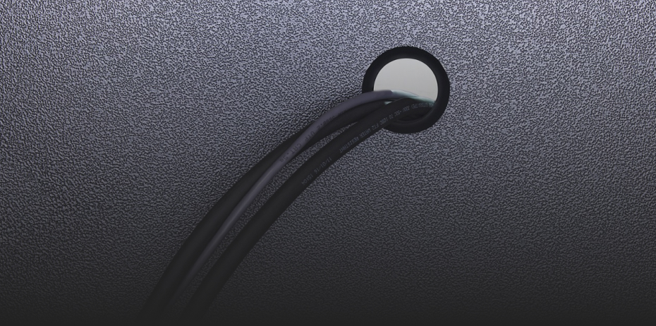 Three cables through a hole in a Gladiator Cabinet