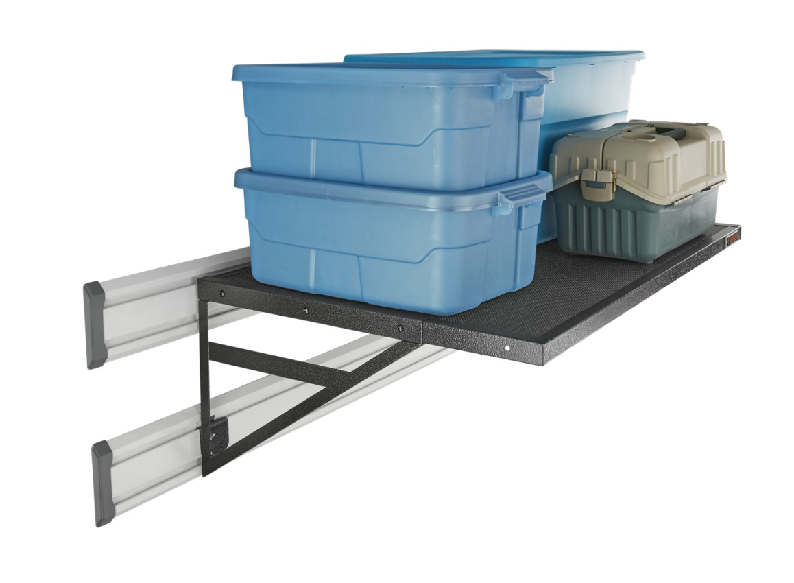 A Gladiator Overhead Max Gearloft Storage Shelf with blue bins and a toolbox.